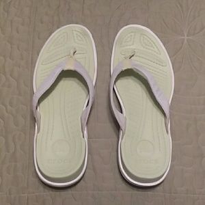 Used croc flip flops